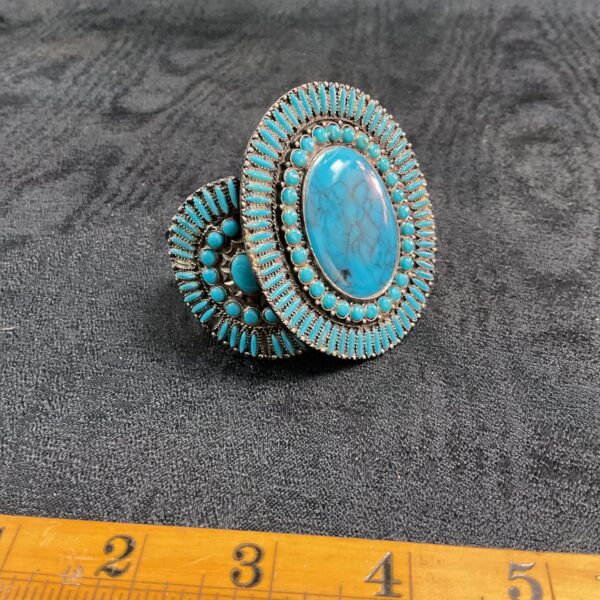 Vintage turquoise cluster bracelet with colourful enamel detailing.