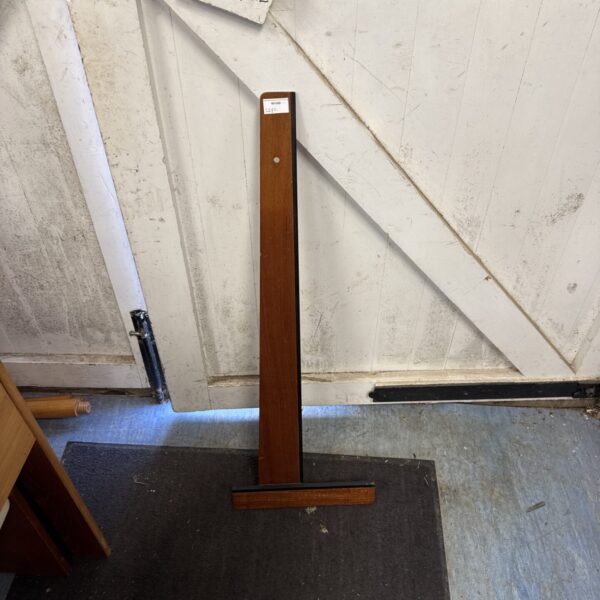 Vintage wooden set square for drafting and architectural drawing.