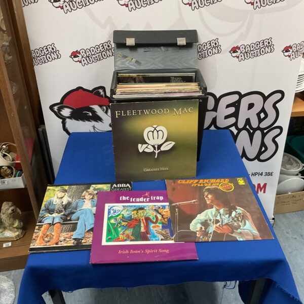 Vinyl record lot featuring Fleetwood Mac, ABBA, and Cliff Richard.