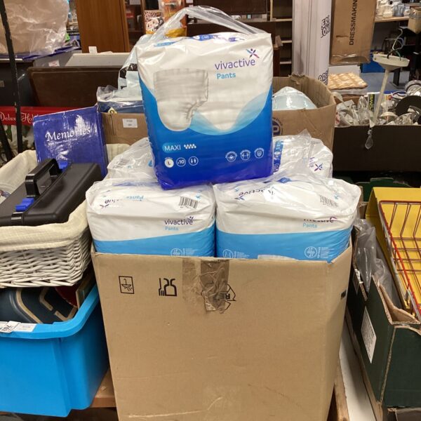 Six unopened packs of large size vivactive incontinence pants.