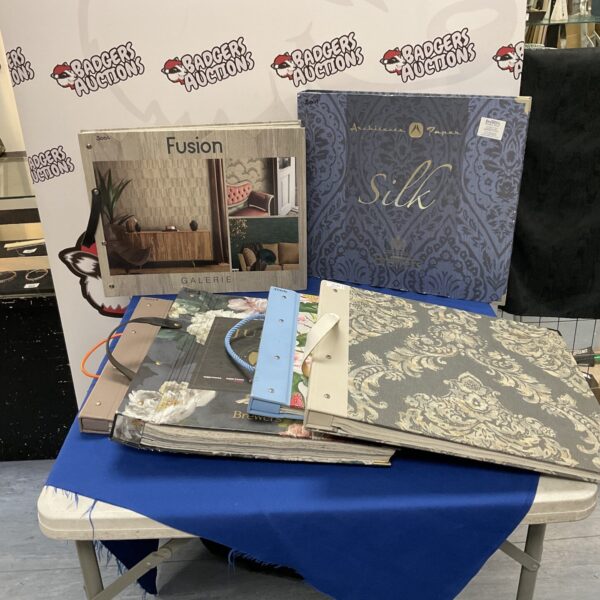 Lot of wallpaper sample books for interior design inspiration.