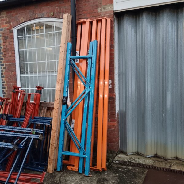 Heavy duty metal warehouse racking for industrial storage.