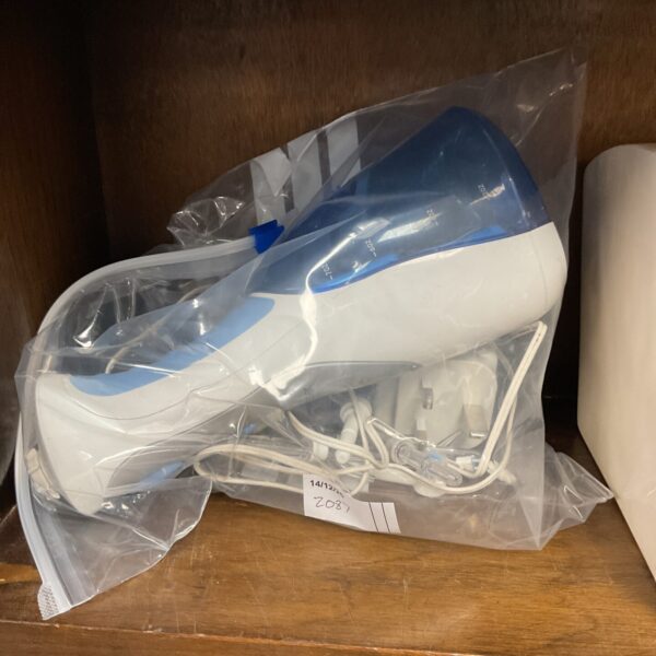 White Waterpik cordless water flosser for oral hygiene.