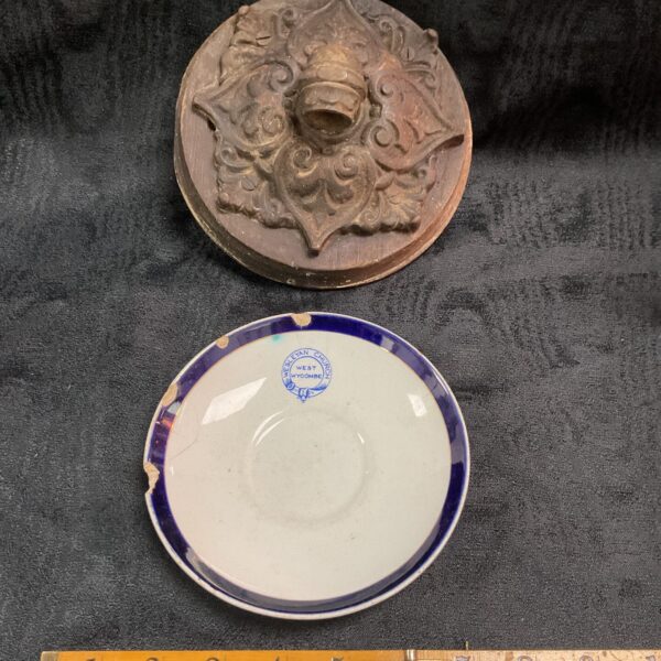 Antique West Wycombe Wesleyan Church saucer and cast iron sconce.