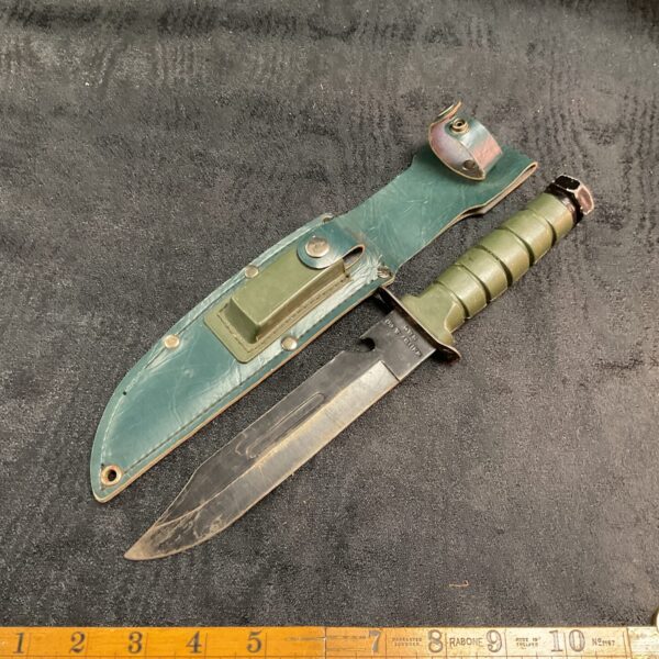 Vintage Whitby & Co sheath knife with original sheath.
