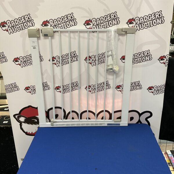 White pressure-mounted safety gate for child and pet safety.