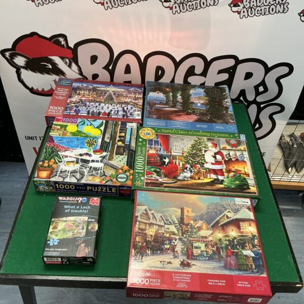 Whs jigsaw puzzle collection featuring Christmas and landscape scenes.