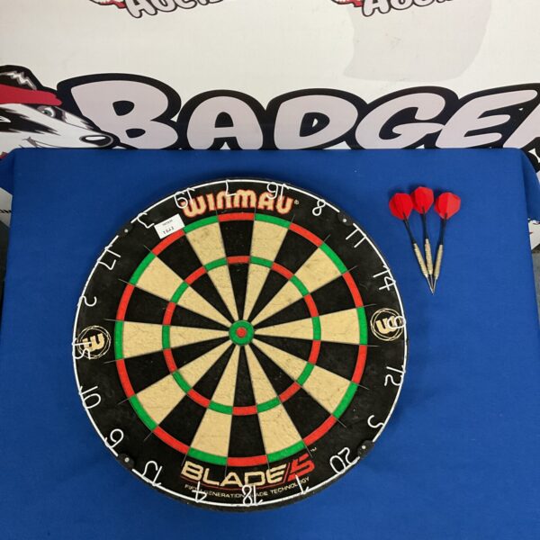 Winmau Blade 5 dartboard with three darts included.