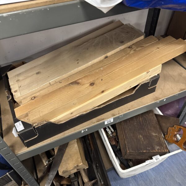 Tray of assorted wood offcuts for DIY projects.
