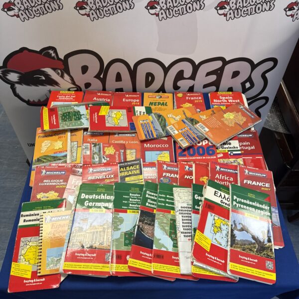 Collection of vintage and modern world maps, including Freytag & Berndt.