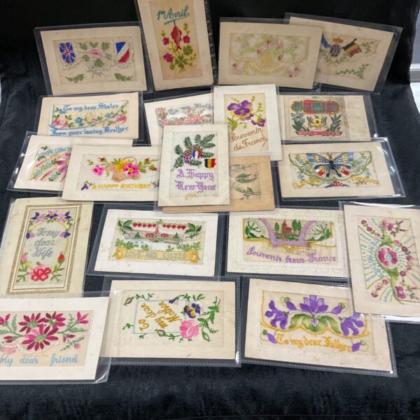Lot of vintage WW1 silk postcards with embroidered designs.