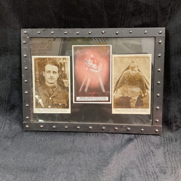 Framed vintage postcards of a WW1 pilot who downed a zeppelin.