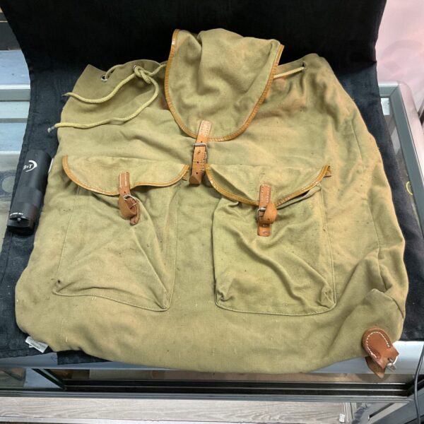 Vintage WWII German rucksack, showing wear and field use.