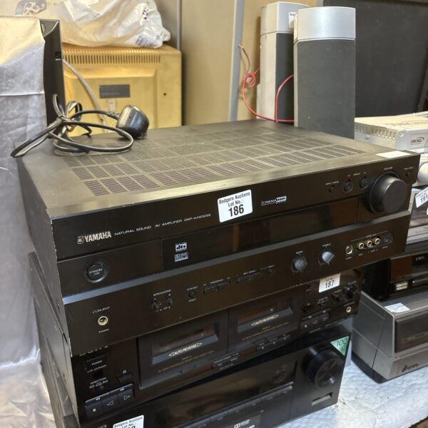Black Yamaha DSP-AX63OSE AV amplifier with front panel controls.