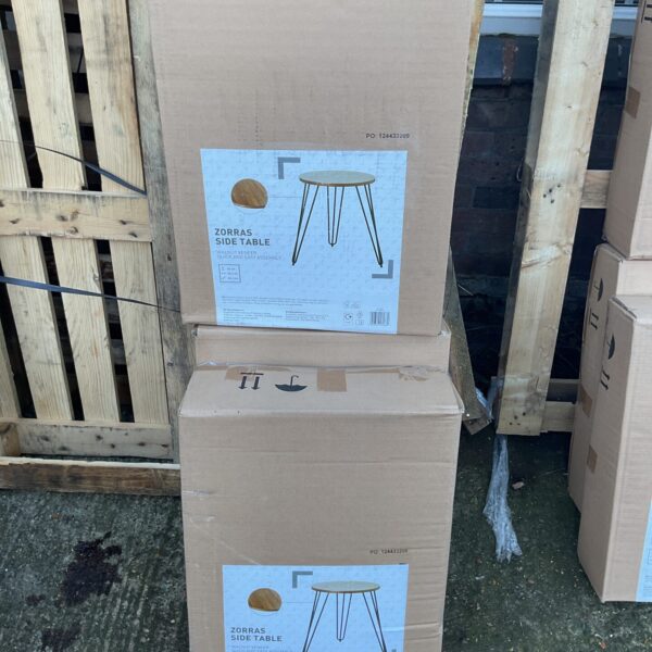 Lot of three vintage Zorras side tables in warm wood tones.