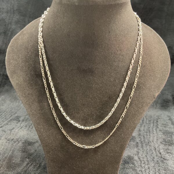 Delicate 925 silver double link necklaces on display.