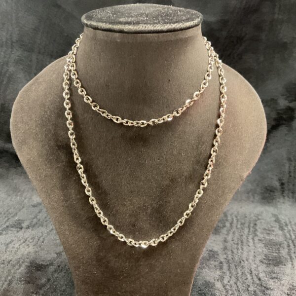 Long 28 inch 925 silver necklace with linked chain design.