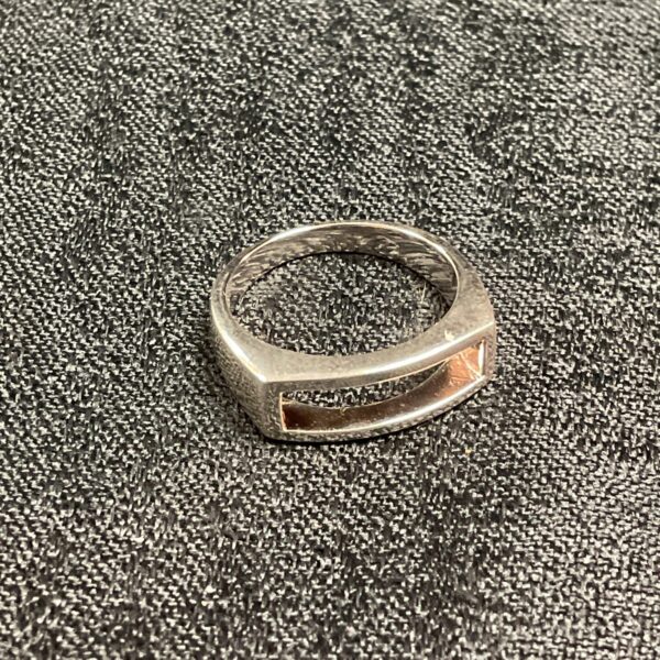 Close-up of a 925 silver slot ring, modern jewellery.