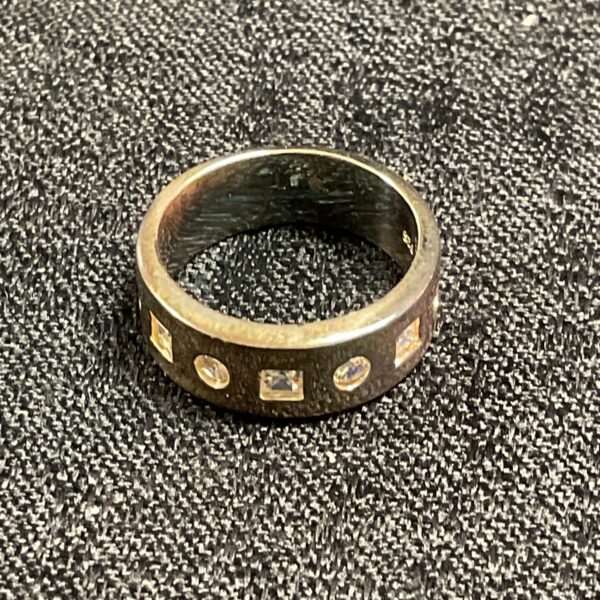 Close-up of a 925 silver whitestone ring, size M.