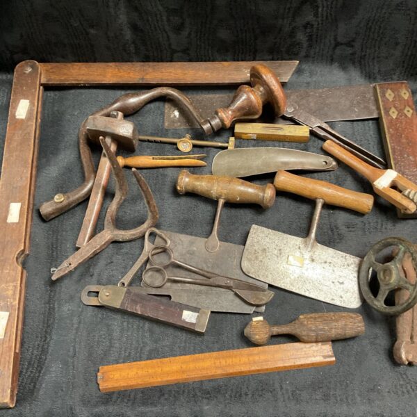 Antique carpenter tools collection, vintage woodworking hand tools.