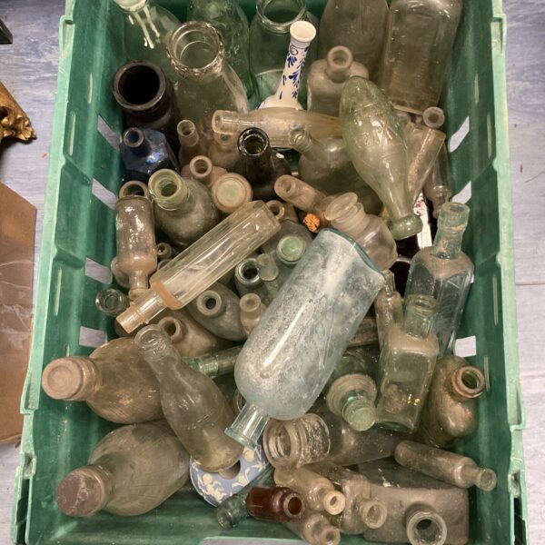 Antique chemist bottles collection, vintage glass apothecary bottles.