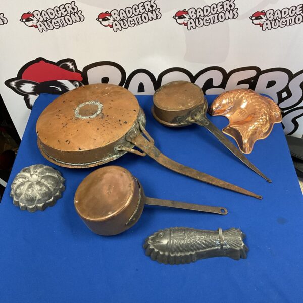 Antique copper pans and vintage fish mould for kitchenalia collectors.