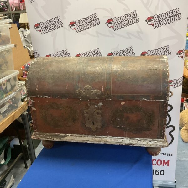 Antique dome-top chest with hand-painted details, vintage storage.