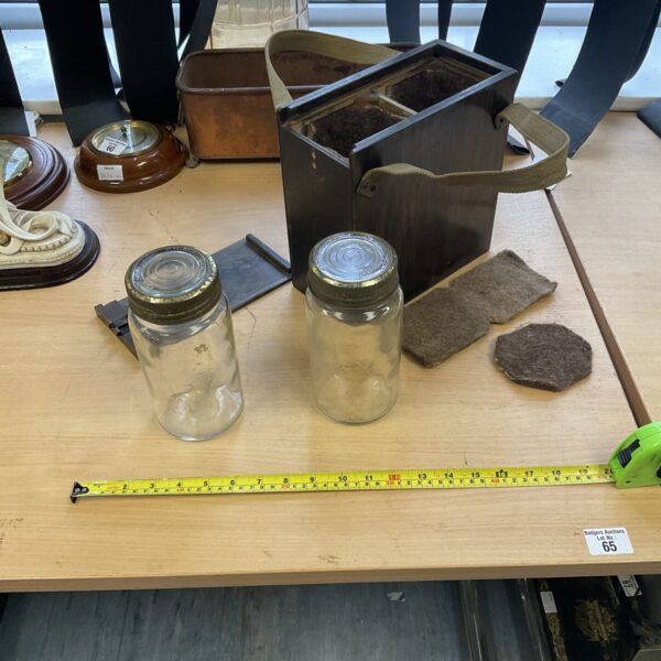 Antique Kilner jars in wooden storage case, vintage glass storage.