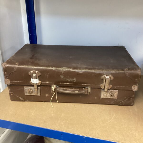 Antique brown leather suitcase with metal clasps and handle.