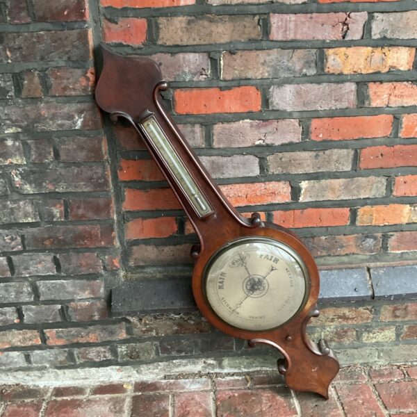 Antique mercury stick barometer with thermometer, Victorian era.