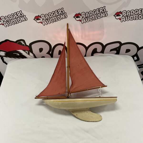 Antique 1920s pond yacht, wooden model boat with metal keel.