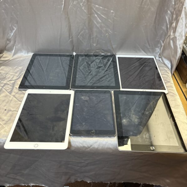 Apple iPad lot of five tablets, vintage tech collection.