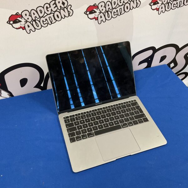 Silver Apple Macbook Air A1932 laptop with open screen.