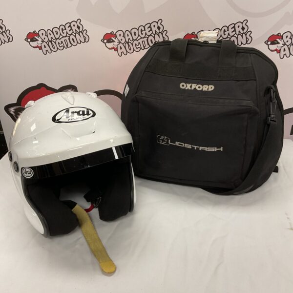 White Arai GP-J3 race helmet with Oxford Lidstash bag.