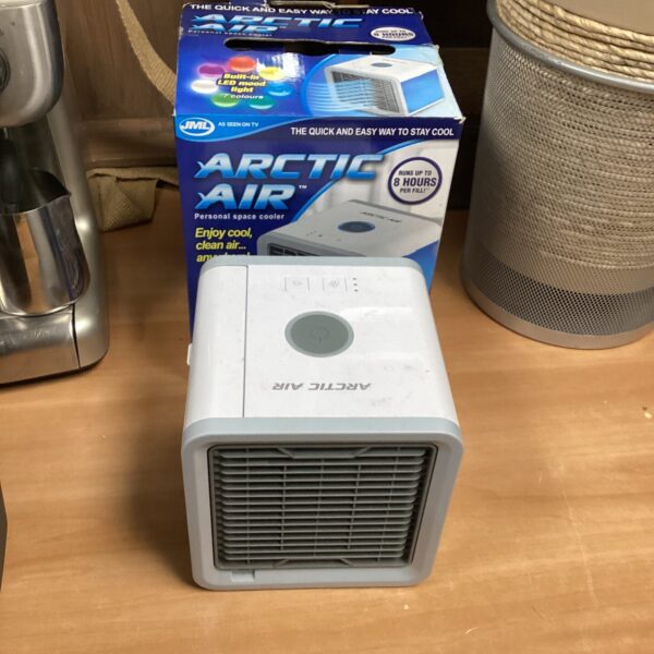 Arctic Air personal cooler with LED mood lighting displayed in packaging.