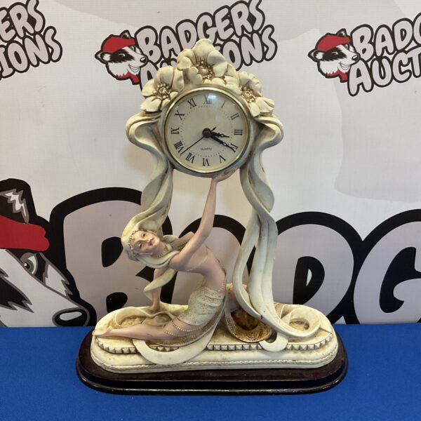 Vintage art deco mantle clock with quartz movement.