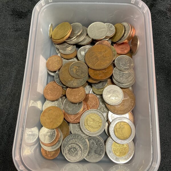 Tub of assorted British coins for collectors and enthusiasts.