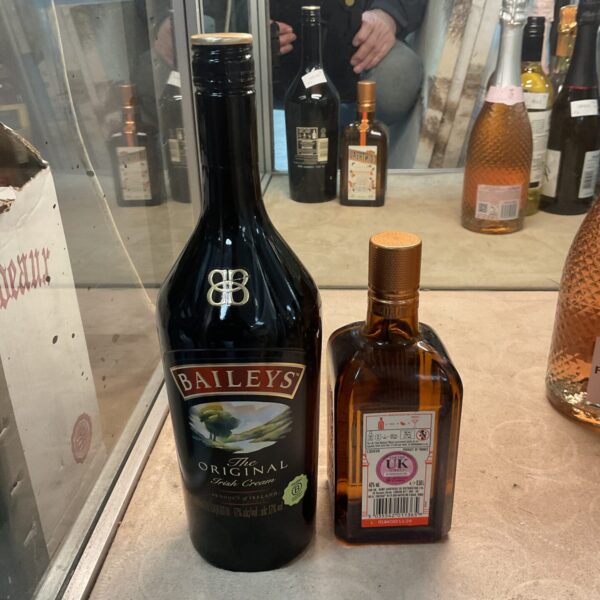 Baileys Irish Cream and Cointreau liqueur bottles on display.