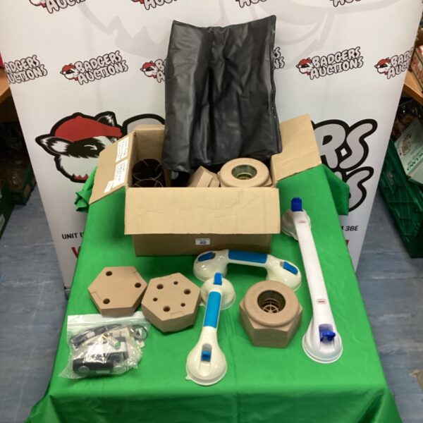 Bathroom safety aids lot including pressure mat and suction handles.