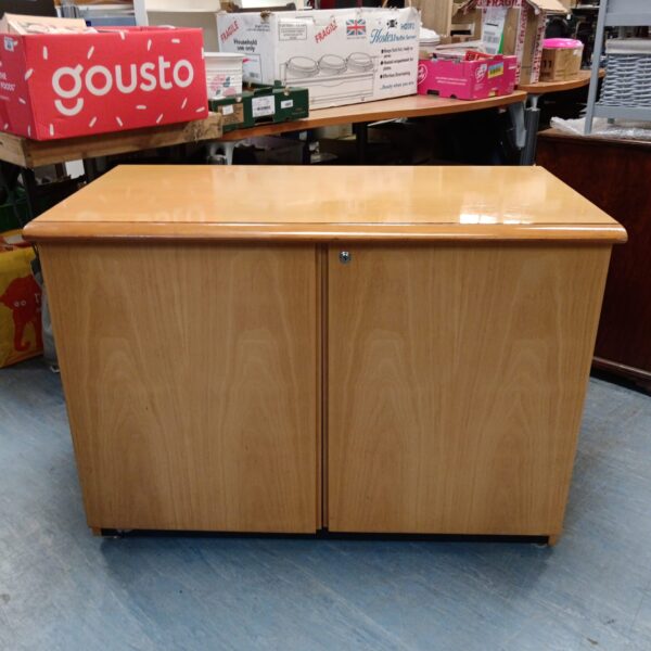 Beech effect wooden office cupboard for storage and organisation.
