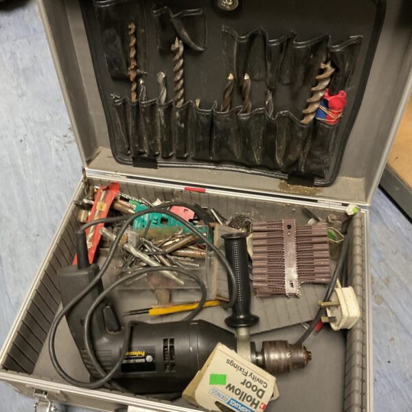 Black & Decker drill set with accessories in open carrying case.