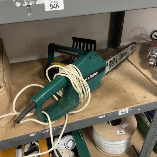 Used Black & Decker electric chainsaw for garden and DIY tasks.
