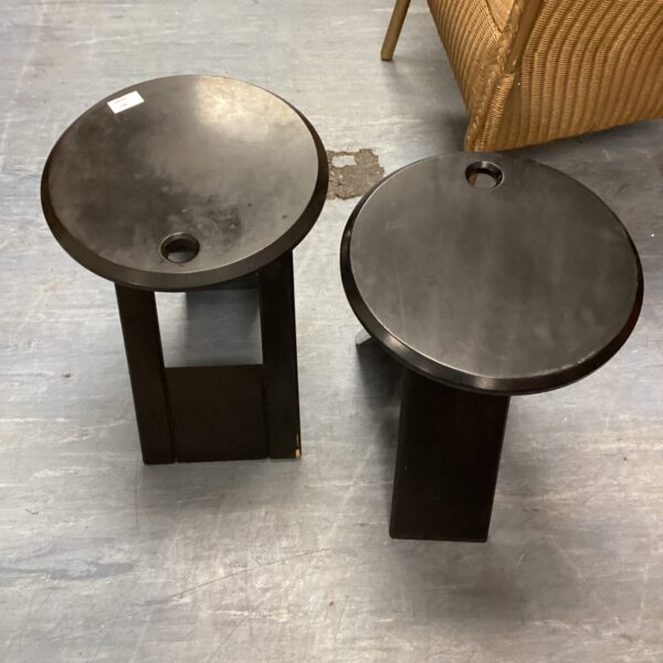 Pair of black Suzy stools with a mid-century modern design.