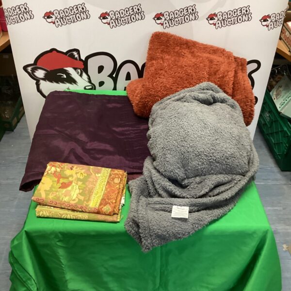 Colorful patchwork blanket and banner lot for bedroom decor.