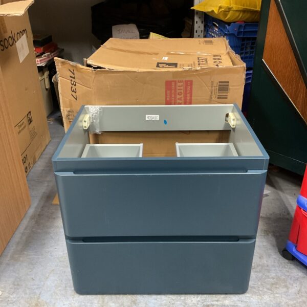 Blue-grey bathroom vanity unit with door, used condition.