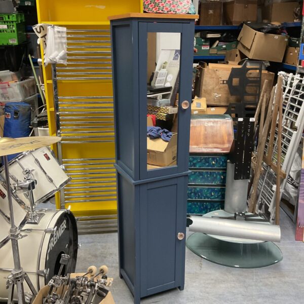 Tall blue-grey mirrored bathroom cabinet for bathroom storage.