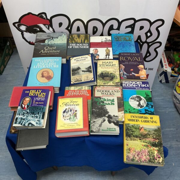 Vintage book collection featuring adventure and non-fiction titles.