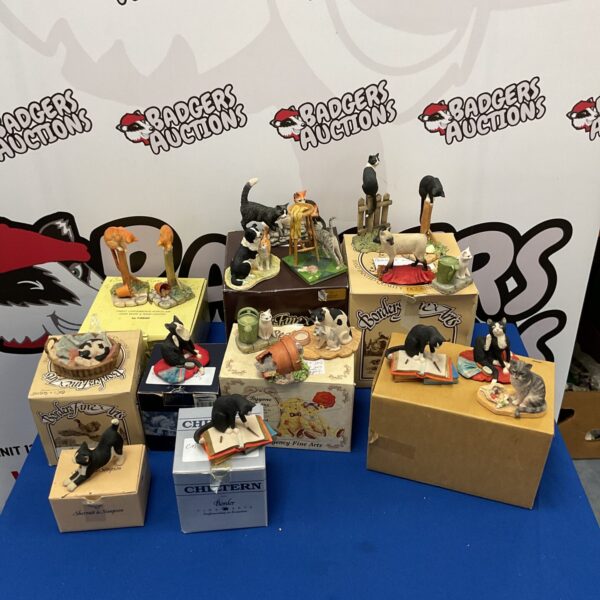 Collection of Border Fine Arts cat figurines and ornaments.