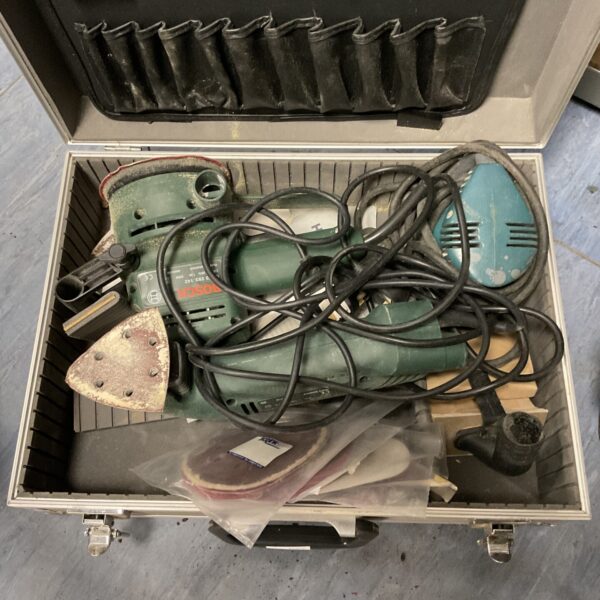 Vintage Bosch sander inside its original carrying case.