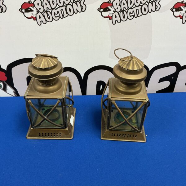 Pair of antique brass carriage lanterns with glass panels.